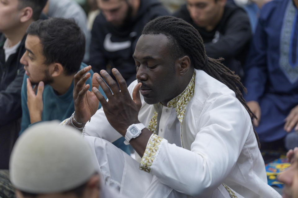 A Muslim man prays to mark the end of the holy month of Ramadan in Los Angeles Wednesday, April 10, 2024. As the war in Gaza enters its seventh month, some Muslim and Arab American leaders have grown frustrated with outreach from President Joe Biden's White House. The fractured relationship could jeopardize the Democratic president's reelection campaign and help pave the way for Republican Donald Trump to return to the White House. (AP Photo/Damian Dovarganes)