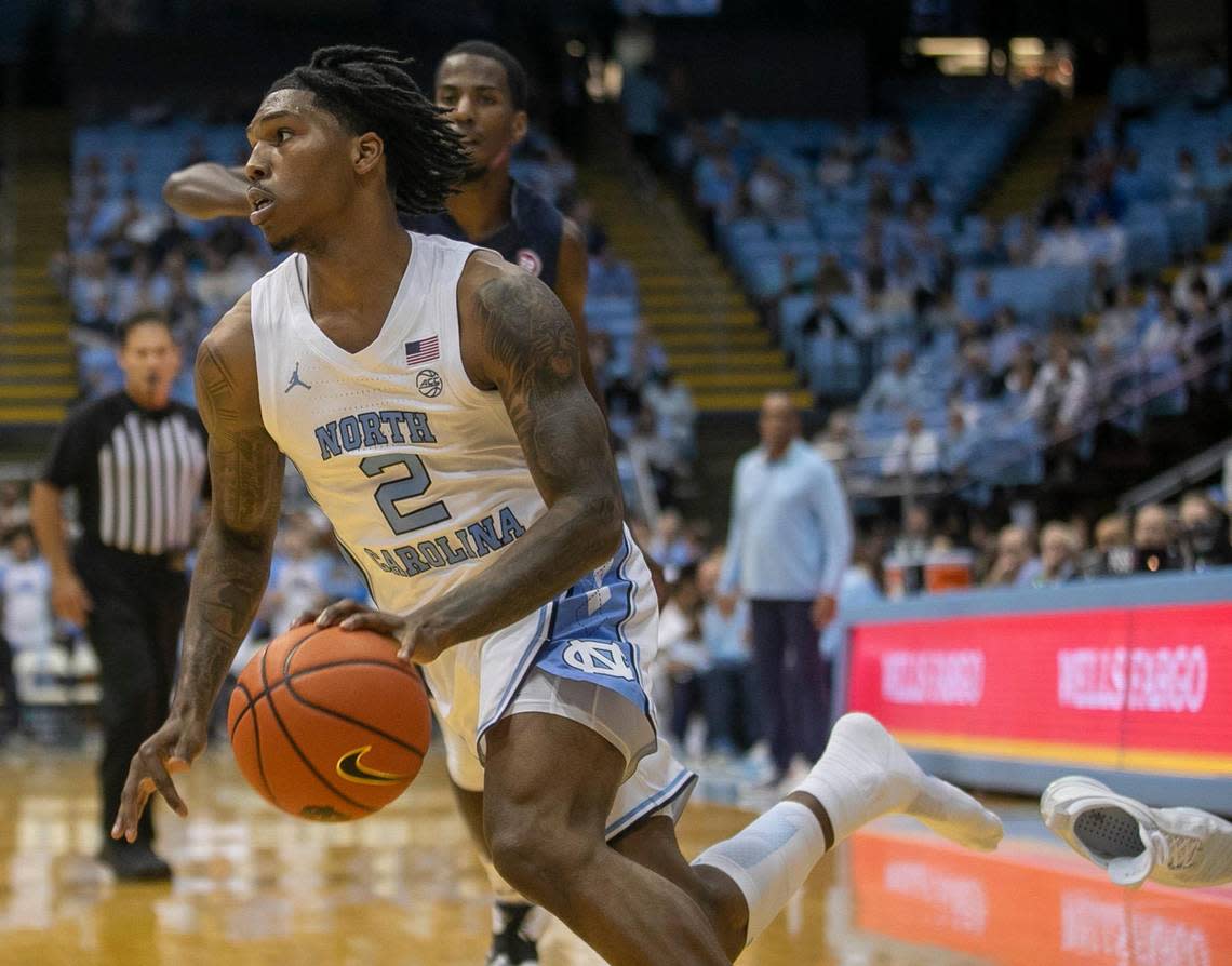 North Carolina’s Caleb Love (2) loses his shoe as he makes a move to the basket in the first half against Johnson C. Smith during an exhibition game on Friday, October 28, 2022 at the Smith Center in Chapel Hill, N.C.