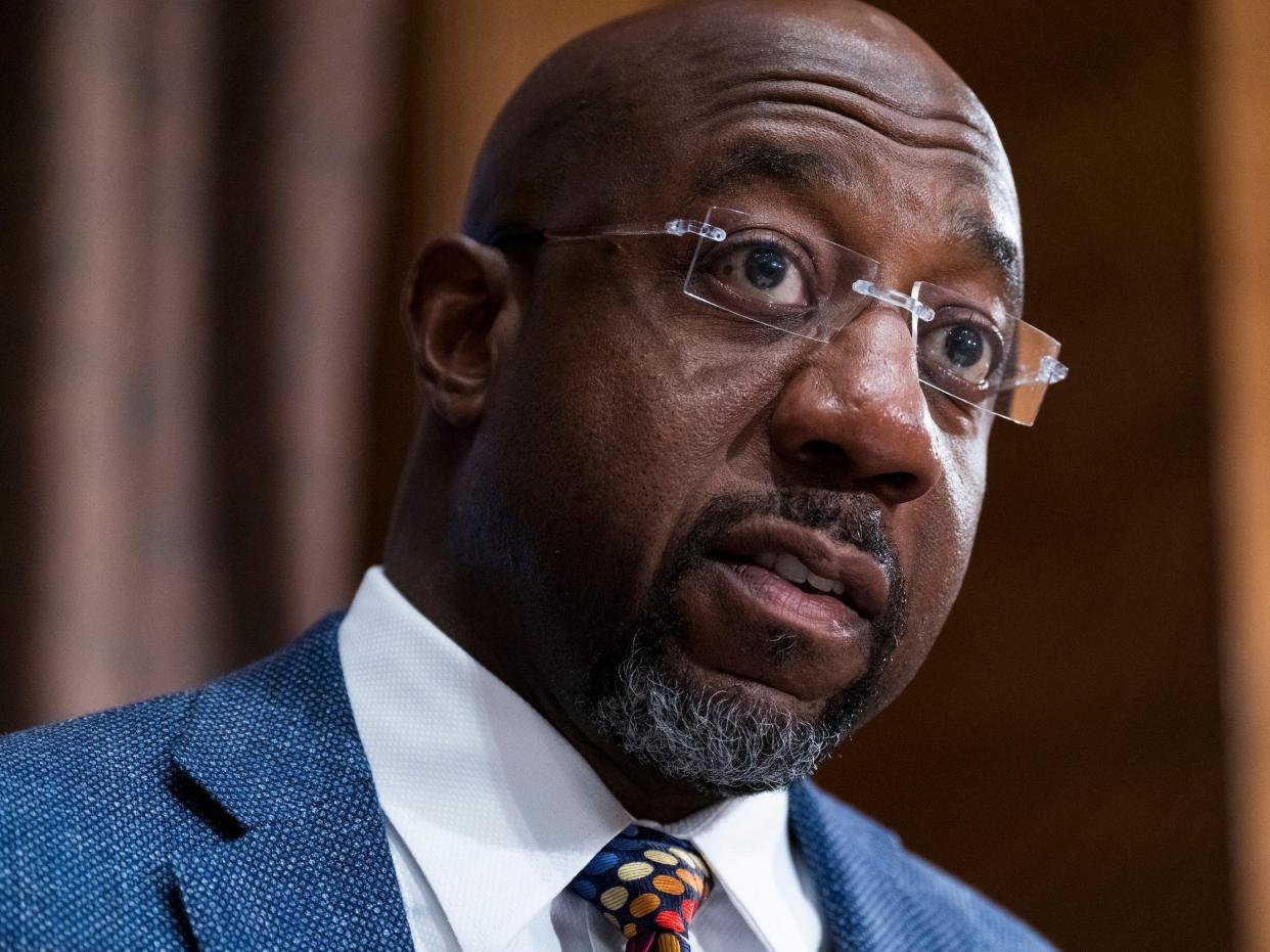 Sen. Raphael Warnock, a Democrat of Georgia, questions Treasury Secretary Janet Yellen as she testifies before the Senate Banking, Housing, and Urban Affairs Committee hearing, Tuesday, May 10, 2022, on Capitol Hill in Washington.