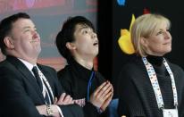 Figure Skating - ISU World Championships 2017 - Men's Free Skating - Helsinki, Finland - 1/4/17 - Yuzuru Hanyu (C) of Japan and his team members react after the performance. REUTERS/Grigory Dukor