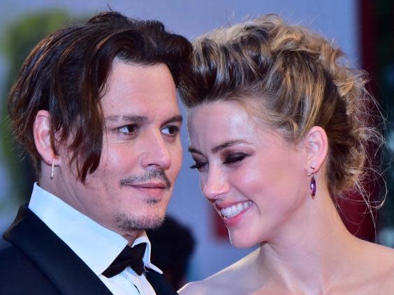 Johnny Depp with ex-wife Amber Heard in September 2015 (AFP/Getty)