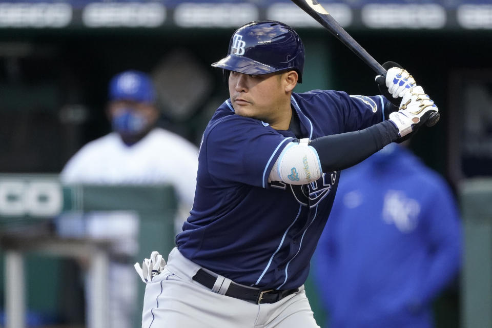 Tampa Bay Rays' Yoshi Tsutsugo bats during the first inning of a baseball game against the Kansas City Royals Tuesday, April 20, 2021, in Kansas City, Mo. (AP Photo/Charlie Riedel)