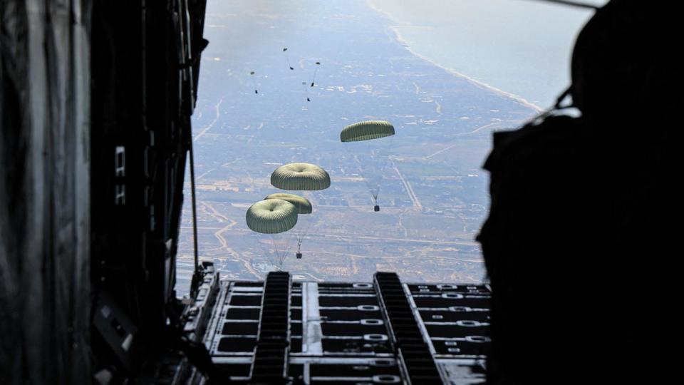 PHOTO: Humanitarian aid being airdropped from a military aircraft over the Gaza Strip, March 11, 2024. (Jordanian army/AFP via Getty Images)