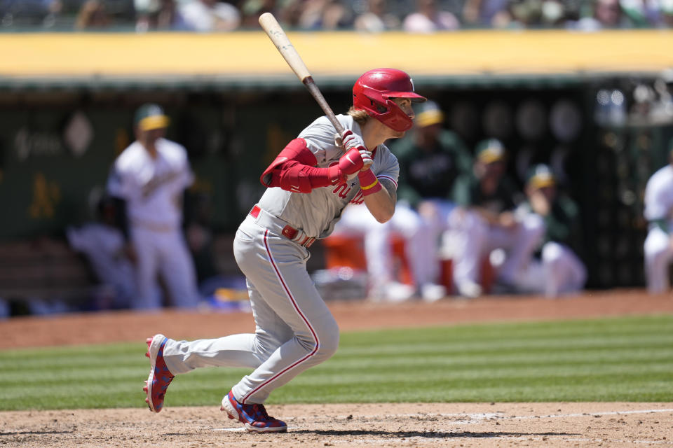 Philadelphia Phillies' Bryson Stott watches his RBI single during the sixth inning of a baseball game against the Oakland Athletics in Oakland, Calif., Saturday, June 17, 2023. (AP Photo/Jeff Chiu)