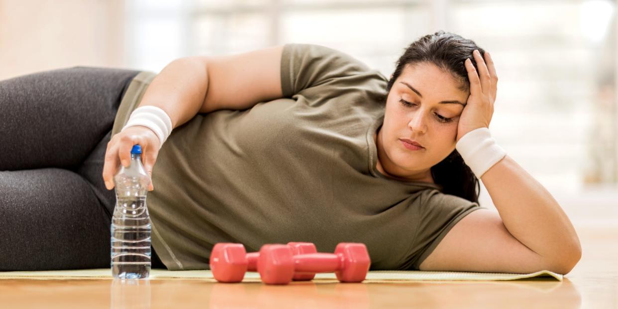 woman bored gym