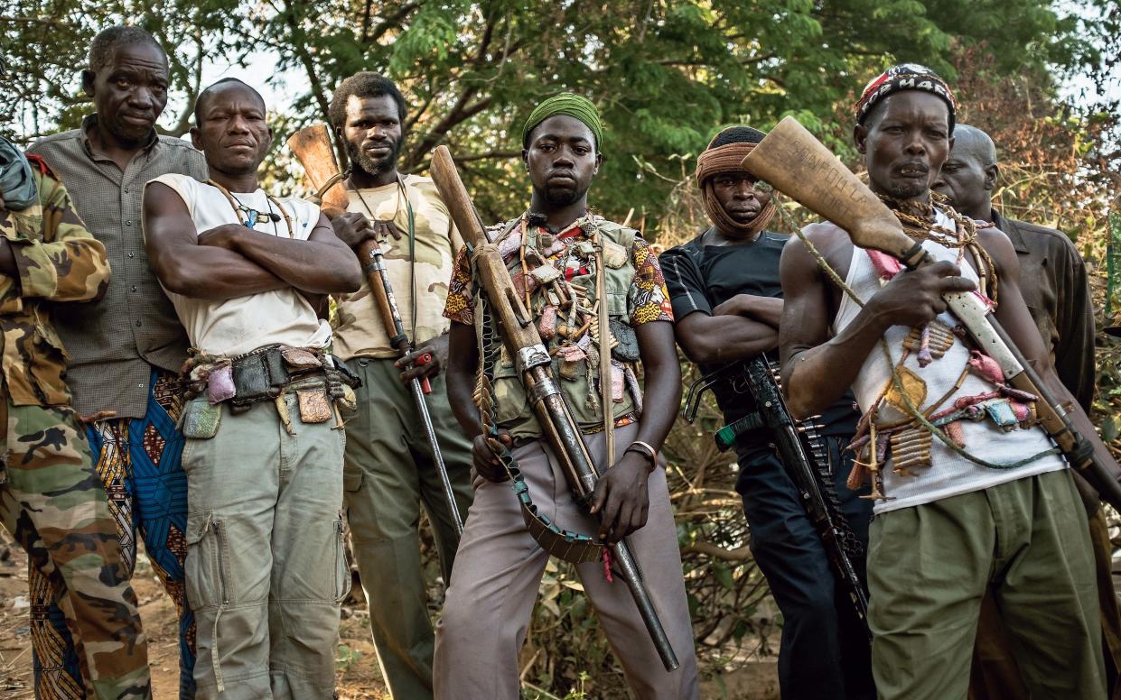 A group of rival Anti-Balaka militiamen in the Central African Republic, the least developed nation on earth which is in the grip of a vicious civil war that the world is ignoring -