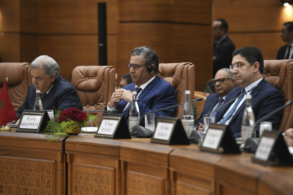 Moroccan Prime Minister Aziz Akhannouch, center, attends alongside Moroccan ministers the twelfth session of the Moroccan-Spanish high-level meeting, in Rabat, Morocco, Thursday, Feb. 2, 2023. The governments of Spain and Morocco held wide-ranging meetings Thursday aimed at turning the page on diplomatic tensions and striking deals on customs crossings and business development. (AP Photo)