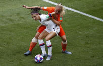 United States' Alex Morgan and Netherlands' Stefanie Van Der Gragt, rear, challenge for the ball during the Women's World Cup final soccer match between US and The Netherlands at the Stade de Lyon in Decines, outside Lyon, France, Sunday, July 7, 2019. (AP Photo/Francois Mori)