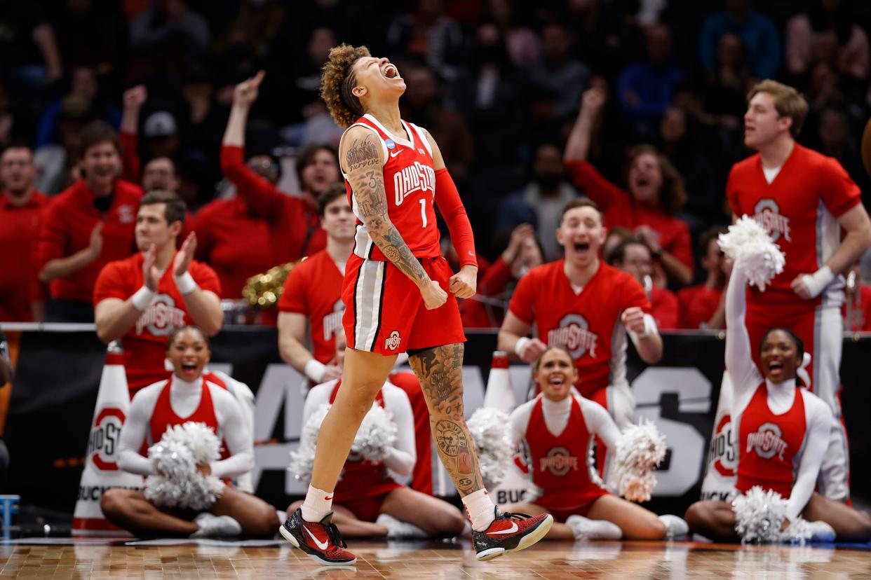 Rikki Harris reacts after making a basket after getting fouled during the fourth quarter against UConn.