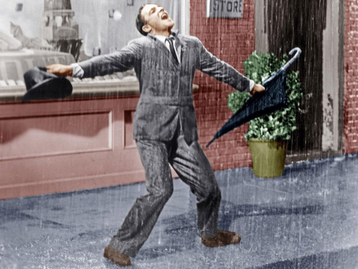 Gene Kelly in Singin' In The Rain from 1952. Researchers are exploring techniques which will allow viewers to sense "raindrops" on their hands or wind on their face as they are watching on television: Rex