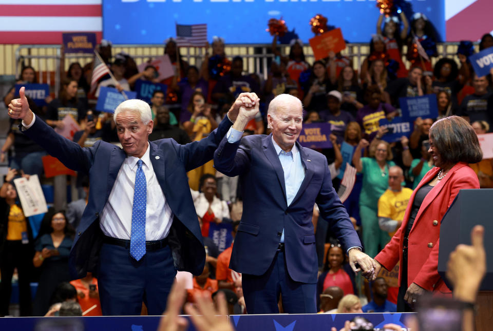 President Joe Biden stands with Senate candidate, Rep. Val Demings (D-FL) and gubernatorial candidate Charlie Crist during a rally at Florida Memorial University on November 01, 2022 in Miami Gardens, Florida. / Credit: Getty Images