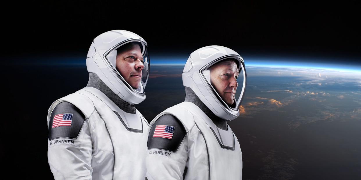 nasa astronauts bob behnken doug hurley spacex crew dragon spacesuits demo2 demo 2 earth background