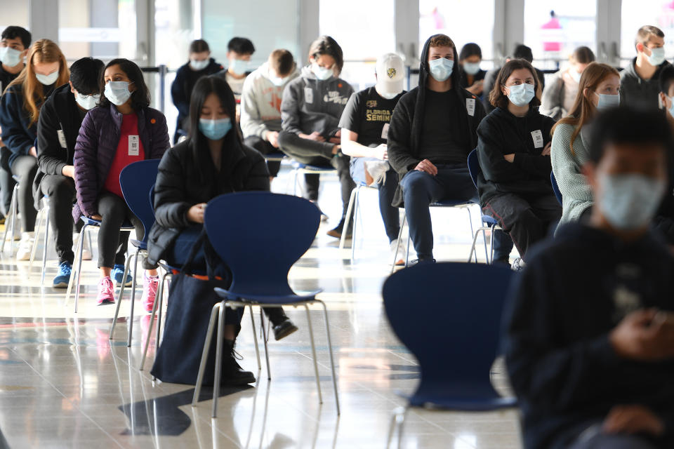 Thousands of Year 12 HSC students begin to get their Pfizer vaccinations at the Mass Vaccination hub at Qudos Arena in Sydney. Source: AAP