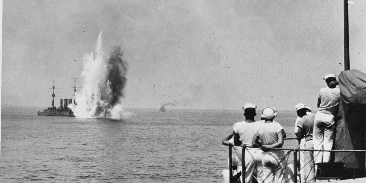 Navy sailors warship aerial bombing