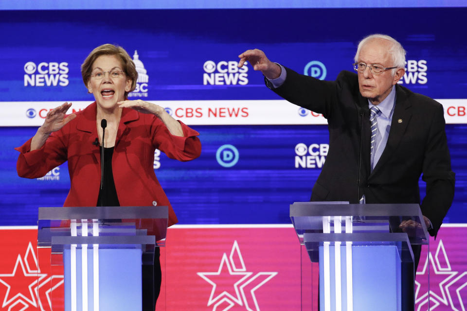 Democratic presidential candidates, Sen. Elizabeth Warren, D-Mass., left, and Sen. Bernie Sanders, I-Vt., right, participate in a Democratic presidential primary debate at the Gaillard Center, Tuesday, Feb. 25, 2020, in Charleston, S.C., co-hosted by CBS News and the Congressional Black Caucus Institute. (AP Photo/Patrick Semansky)