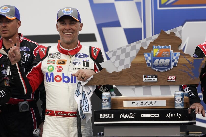 Kevin Harvick celebrates after winning a NASCAR Cup Series race at Richmond Raceway on Sunday.