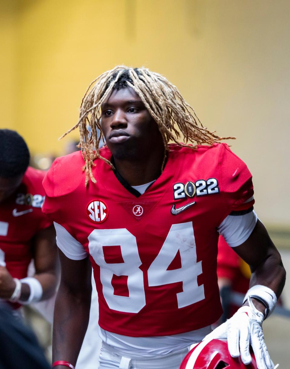 Agiye Hall, who transferred from Alabama to Texas this offseason, was suspended by Longhorns coach Steve Sarkisian following an arrest on a criminal mischief charge.