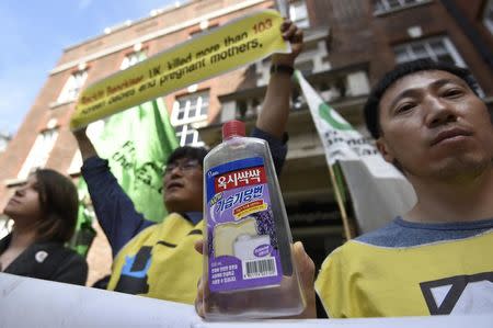 Protestors who claim that a sterilising hygiene product made by Reckitt Benckiser has led to deaths in South Korea, demonstrate ahead of the company's annual general meeting in London, Britain May 5, 2016. REUTERS/Toby Melville