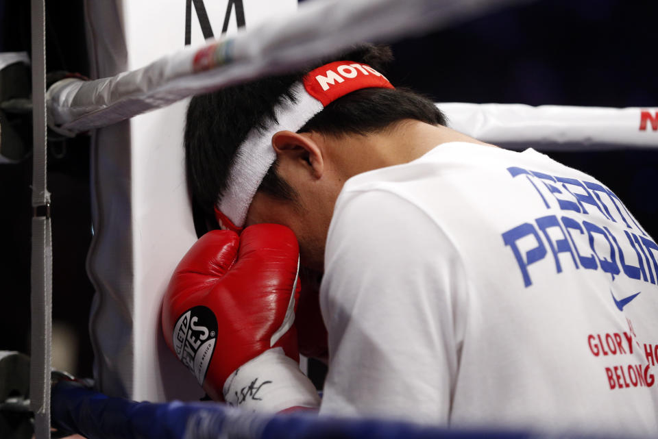 Manny Pacquiao, from the Philippines, gets ready before the welterweight title fight against  Floyd Mayweather Jr., on Saturday, May 2, 2015 in Las Vegas. (AP Photo/John Locher)