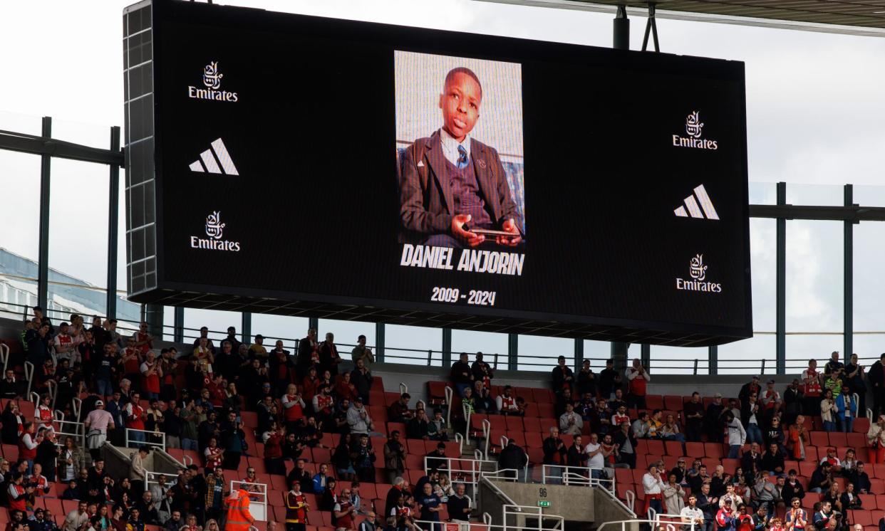 <span>Daniel Anjorin, an Arsenal fan, was remembered during his team’s home game against Bournemouth.</span><span>Photograph: Tolga Akmen/EPA</span>