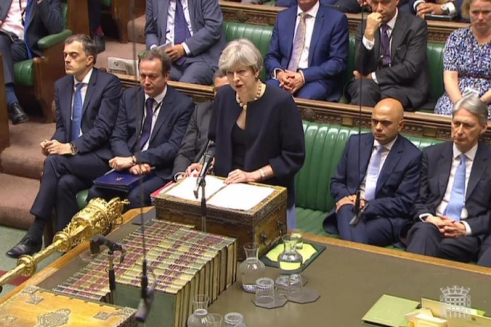 Theresa May speaking about the Grenfell disaster in Parliament on Thursday (AFP/Getty Images)