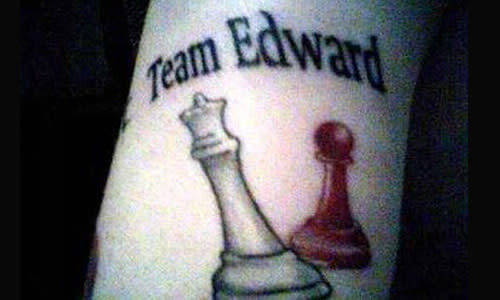 <p>This fan, obviously on 'Team Edward', wears her badge proudly on her wrist...As well as the chest pieces featured on the 'Breaking Dawn' book cover. <br><br><a rel="nofollow" href="http://au.thehype.yahoo.com/galleries/g/-/10378929/celebrity-bullsh-tters/10378934/" data-ylk="slk:PICS: Celebritty Bullsh*tters;elm:context_link;itc:0;sec:content-canvas" class="link ">PICS: Celebritty Bullsh*tters</a></p>