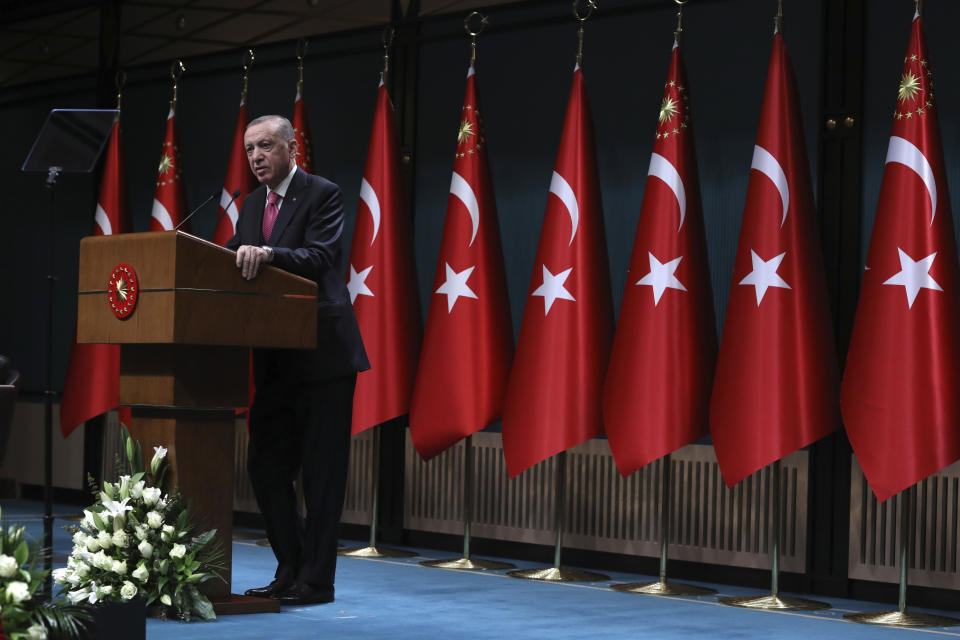 FILE - Turkey's President Recep Tayyip Erdogan speaks after he signed a decision confirming the election date, in Ankara, Turkey, Friday, March 10, 2023.(AP Photo/Burhan Ozbilici, File)