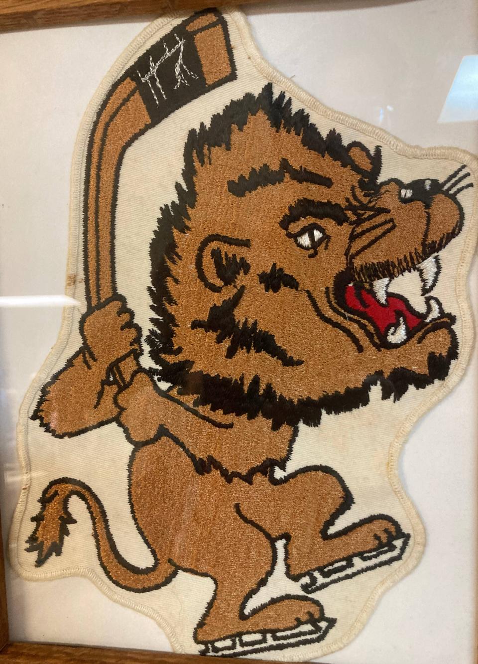 An embroidered Erie Lions patch was among the memorabilia on display during Friday's team reunion at the Sunflower Club. Ron Sciarrilli, a former player, organized the team's first reunion since 1986.