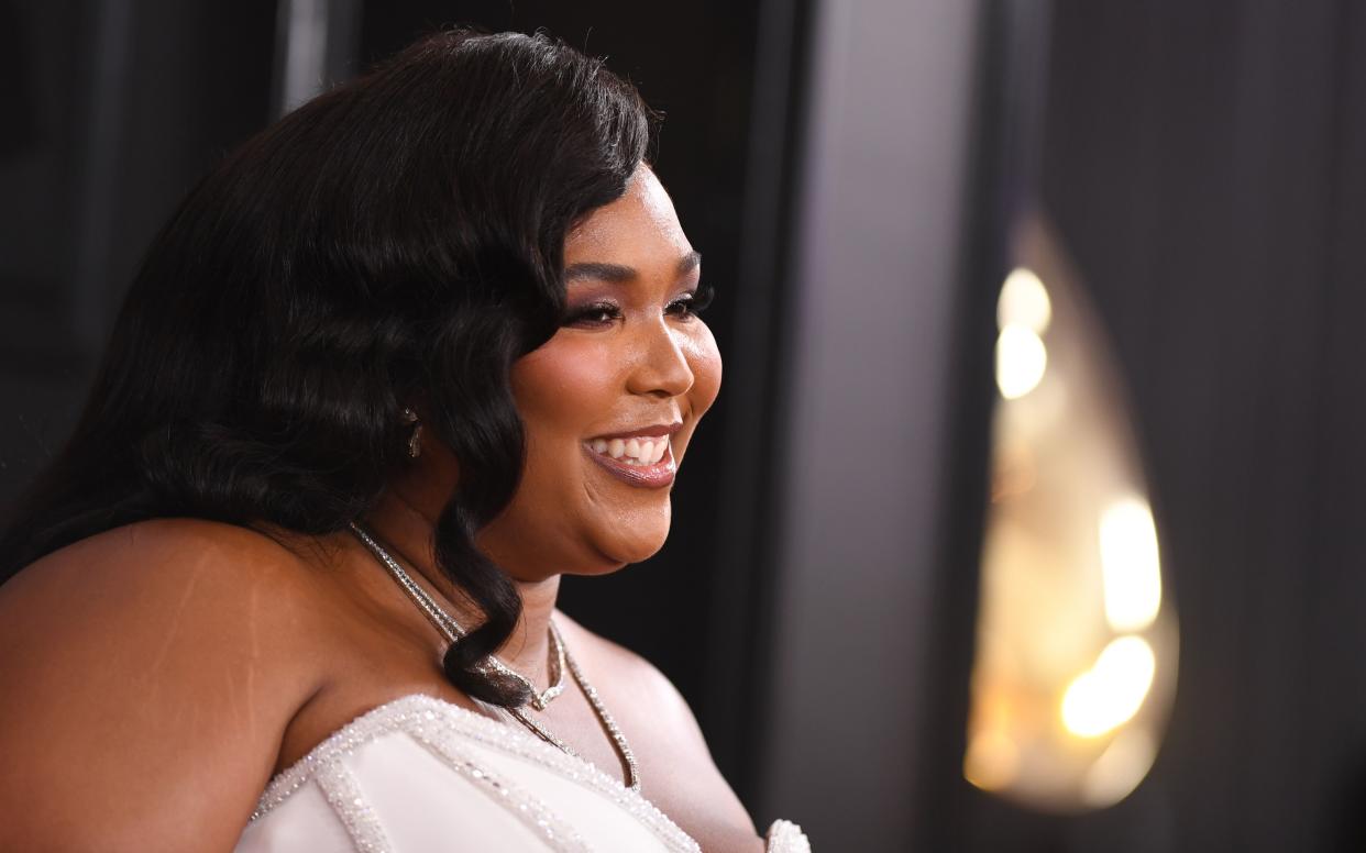 US singer-songwriter Lizzo arrives for the 62nd Annual Grammy Awards on January 26, 2020, in Los Angeles. (Photo by VALERIE MACON / AFP) (Photo by VALERIE MACON/AFP via Getty Images)