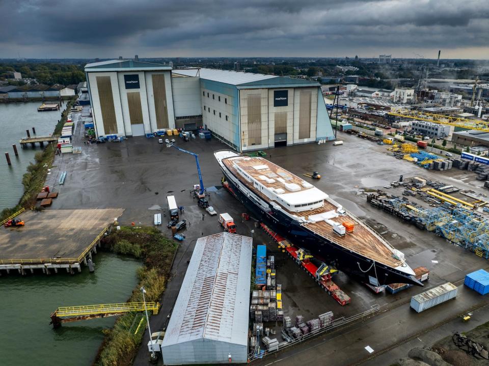 Aeriel view of shipyard with large, unfinished yacht reportedly belonging to Jeff Bezos