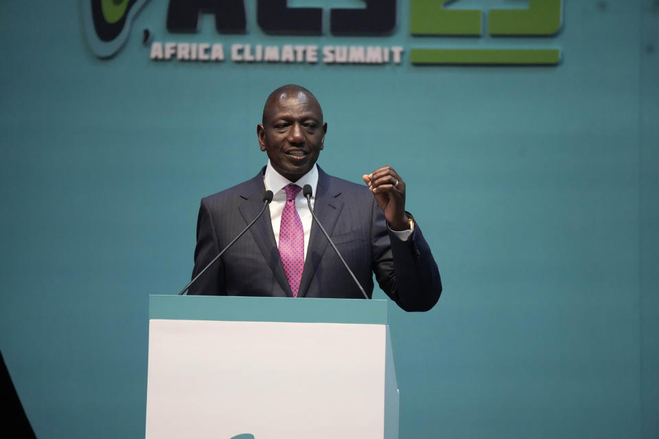 Kenyan President William Ruto, addresses delegates during the official opening of the Africa Climate Summit at the Kenyatta International Convention Centre in Nairobi, Kenya, Monday, Sept. 4, 2023. The first African Climate Summit opened with heads of state and others asserting a stronger voice on a global issue that affects the continent of 1.3 billion people the most, even though they contribute to it the least. (AP Photo/Khalil Senosi)