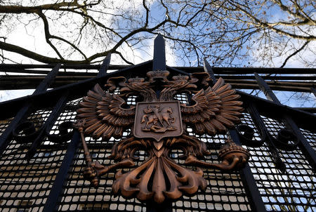 A coat of arms is seen on a gate outside of the Russian embassy in London, Britain, March 16, 2018. REUTERS/Toby Melville