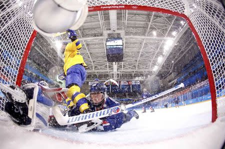 Ice Hockey – Pyeongchang 2018 Winter Olympics – Women Preliminary Round Match - Sweden v Korea - Kwandong Hockey Centre, Gangneung, South Korea – February 12, 2018 - Hwang Chung Gum of Korea in action. REUTERS/Kim Kyung-Hoon