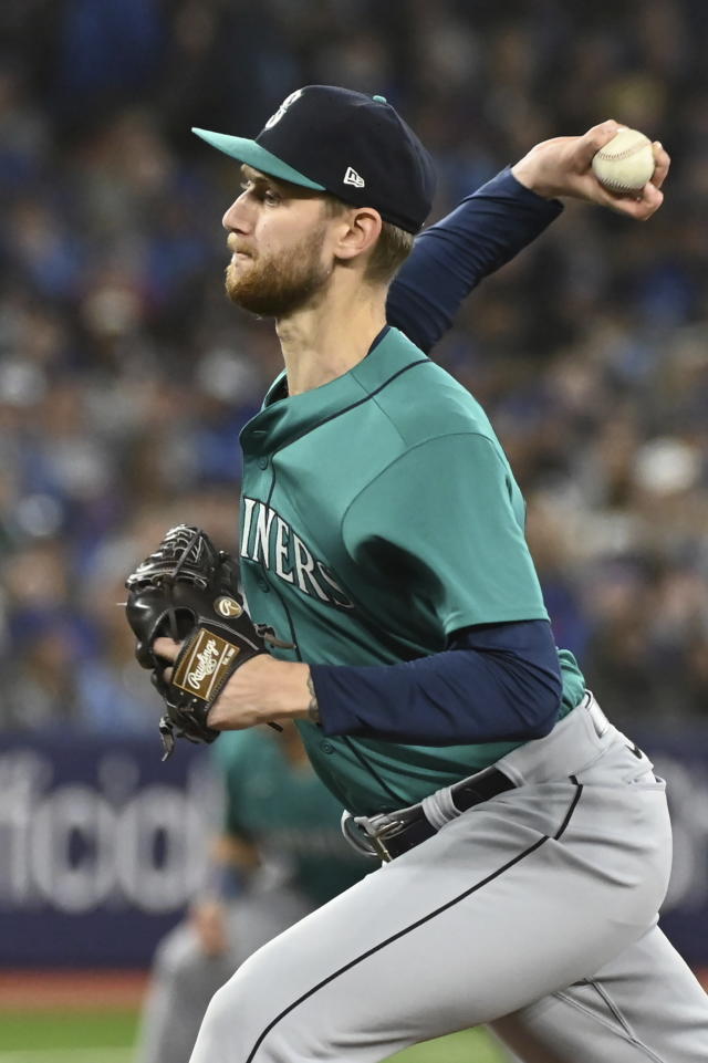 Seattle Mariners starting pitcher Easton McGee (59) throws to a Toronto Blue Jays batter during the first inning of a baseball game in Toronto, Saturday, April 29, 2023. (Jon Blacker/The Canadian Press via AP)