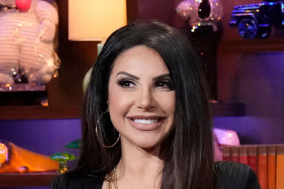 Jennifer Aydin smiles while at the Watch What Happens Live clubhouse.