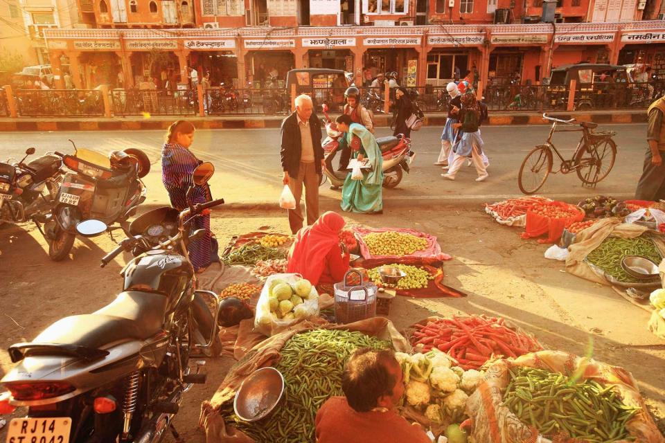 Street vendors selling fresh produce in Johari Bazaar