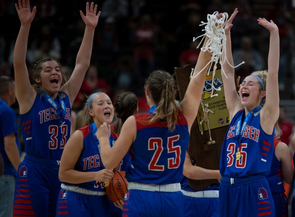 The Tecumseh Braves celebrate during the IHSAA girls basketball Class A state championship at Gainbridge Fieldhouse in Indianapolis, Ind., Saturday morning, Feb. 26, 2022. The Tecumseh Braves earned a 60-53 win over the Lafayette Central Catholic Knights to become state champions. 