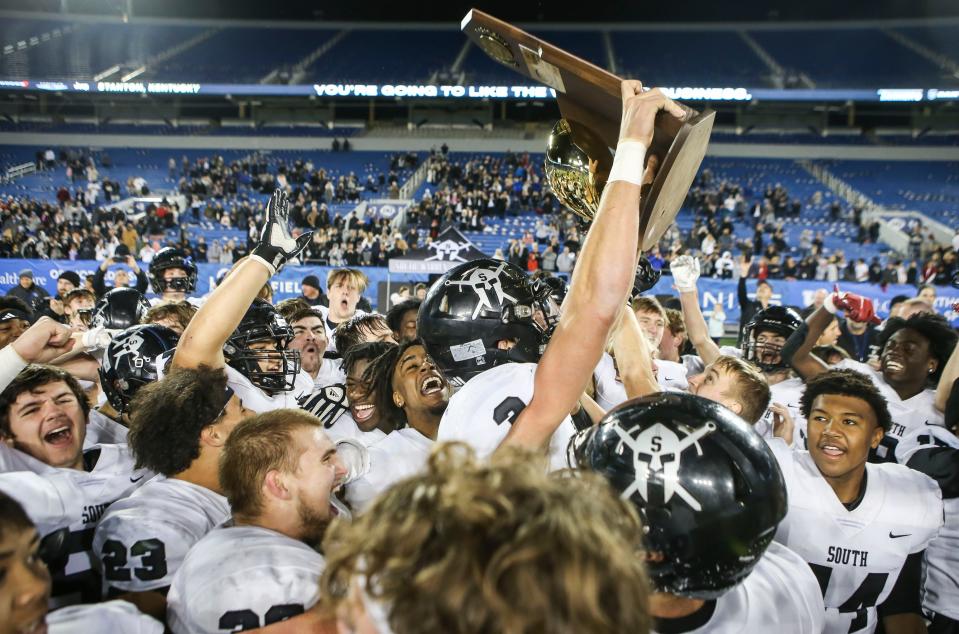 South Warren celebrates after defeating Frederick Douglass to win the 5A KHSAA football championship Saturday. Dec.3, 2021 