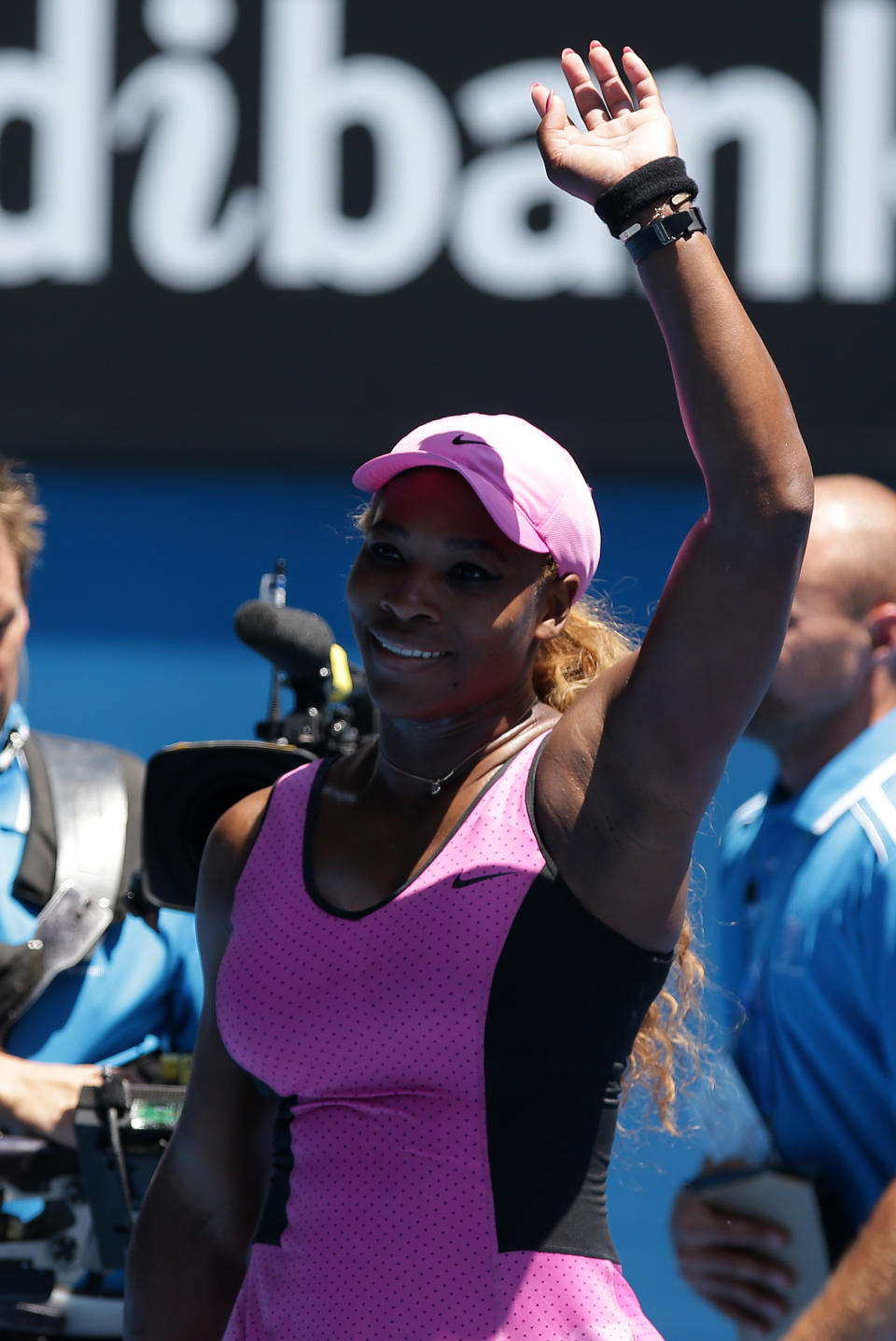 Serena Williams of the U.S. celebrates after defeating Daniela Hantuchova of Slovakia in their third round match at the Australian Open tennis championship in Melbourne, Australia, Friday, Jan. 17, 2014.(AP Photo/Aaron Favila)