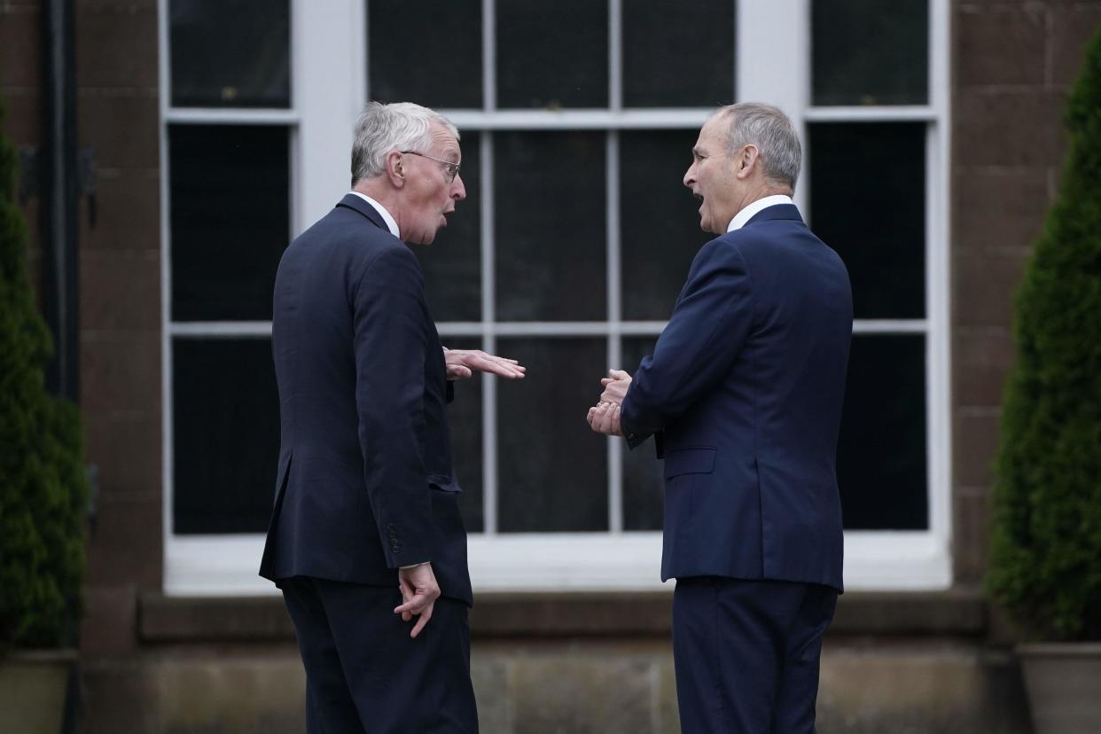 Northern Ireland Secretary Hilary Benn (left) and Tanaiste Micheal Martin ahead of a meeting at Hillsborough Castle, in Belfast.