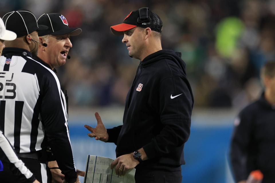 Cincinnati Bengals head coach Zac Taylor talks with the referees during the third quarter of a regular season NFL football matchup Monday, Dec. 4, 2023 at EverBank Stadium in Jacksonville, Fla. The Cincinnati Bengals defeated the Jacksonville Jaguars 34-31 in overtime. [Corey Perrine/Florida Times-Union]