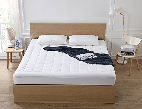 <p><strong>Oaskys </strong></p><p>amazon.com</p><p><strong>$28.82</strong></p><p>This soft mattress topper features a square jacquard design rather than the diamond quilting pattern commonly found in a pillow top mattress topper. The manufacturer says it prevents the filling from moving around. Made with a breathable fabric, it will keep you cool and asleep the entire night.</p><p>The plushiness of this <a href="https://www.womenshealthmag.com/health/g36410876/best-cooling-mattress-toppers/" rel="nofollow noopener" target="_blank" data-ylk="slk:cooling topper" class="link ">cooling topper</a> can soften a firm mattress, which makes it a great option for back pain and people who tend to sweat a lot while snoozing.</p><p>One happy reviewer said, "It does have cooling properties due to it being able to breathe, I no longer have issues sweating at night. If you want to transform your pillow top mattress, non-pillow top, foam mattress, or even just have issues with controlling heat, get this product!"</p>