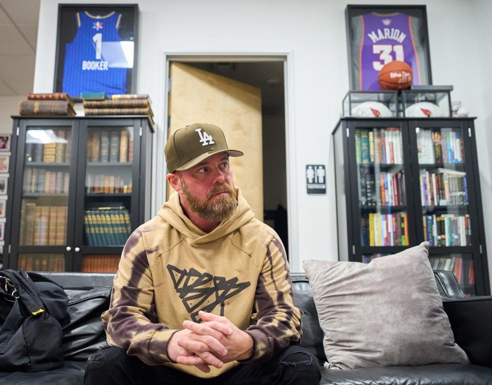 Travis Hearn, Impact Church senior pastor and team chaplain to the Phoenix Suns, speaks with Dana Scott from The Arizona Republic in his office at Impact Church in Scottsdale, on Tuesday, Jan. 24, 2023.