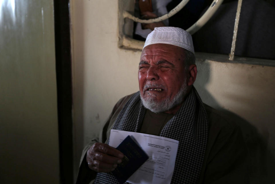 <p>A Palestinian man cries as he asks for a permit to cross into Egypt through the Rafah border crossing after it was opened by Egyptian authorities for humanitarian cases, in the southern Gaza Strip, Feb. 7, 2018. (Photo: Ibraheem Abu Mustafa/Reuters) </p>