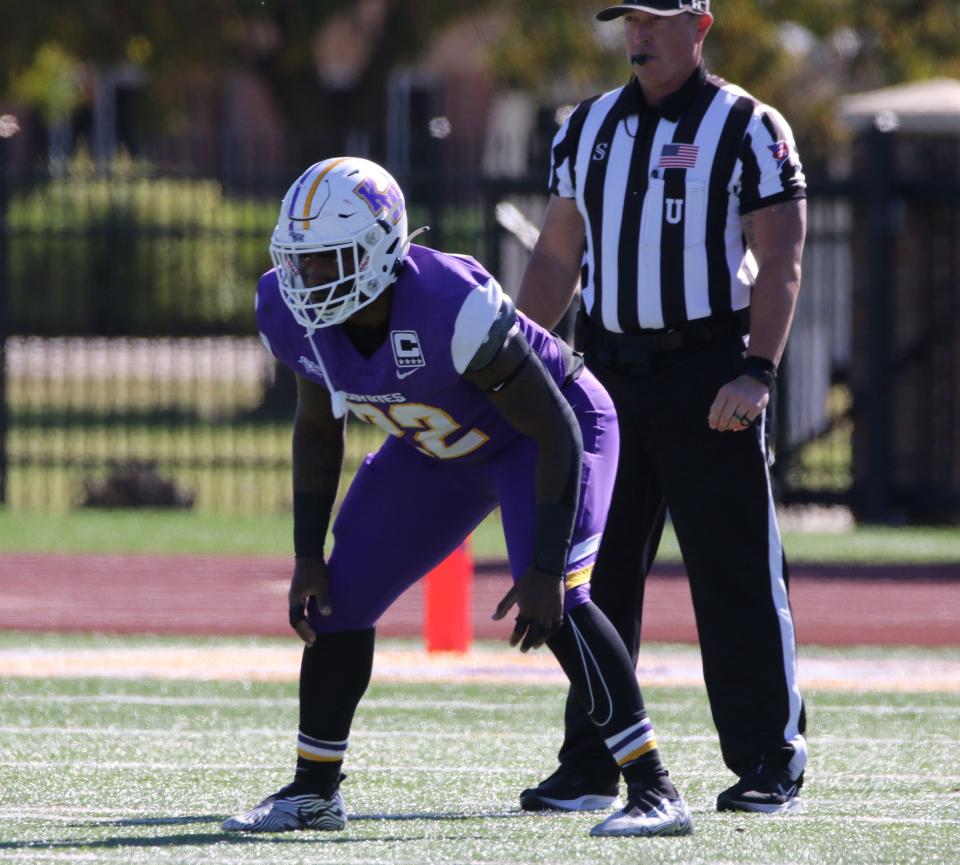 Kansas Wesleyan linebacker DeVante' Gabriel (22) prepares for a play against Ottawa on Oct. 30 at Graves Family Sports Complex.