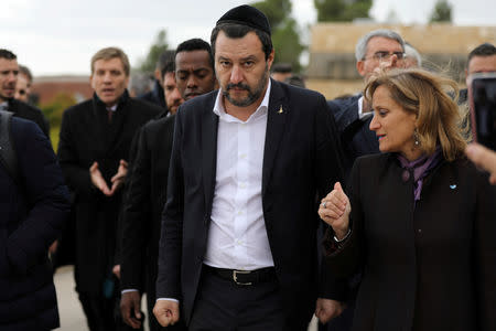 FILE PHOTO: Italian Deputy Prime Minister and right-wing League party leader Matteo Salvini (C) visits Yad Vashem World Holocaust Remembrance Center in Jerusalem December 12, 2018. REUTERS/Ammar Awad -/File Photo