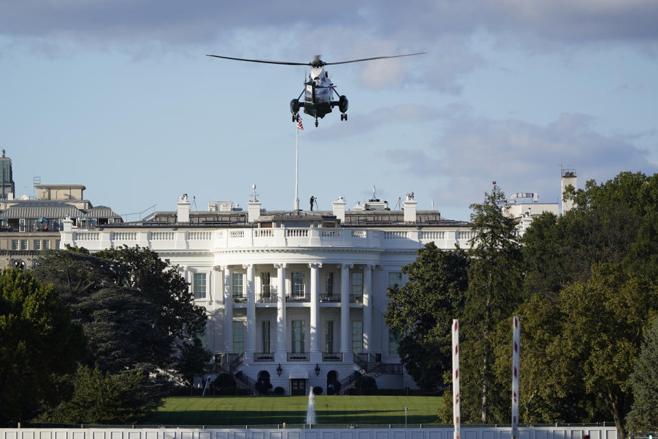 The helicopter that will carry President Donald Trump to Walter Reed National Military Medical Center in Bethesda, Md., lands on the South Lawn of White House in Washington, Friday, Oct. 2, 2020. The White House says Trump will spend a "few days" at the military hospital after contracting COVID-19. (AP Photo/J. Scott Applewhite)