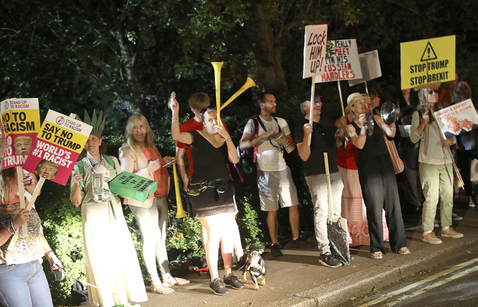 Demonstrators gather at the US ambassador residence in Regent’s Park, London, on Thursday as part of the protests against the visit of US President Donald Trump to the UK. (Photo by Rick Findler/PA Images via Getty Images)