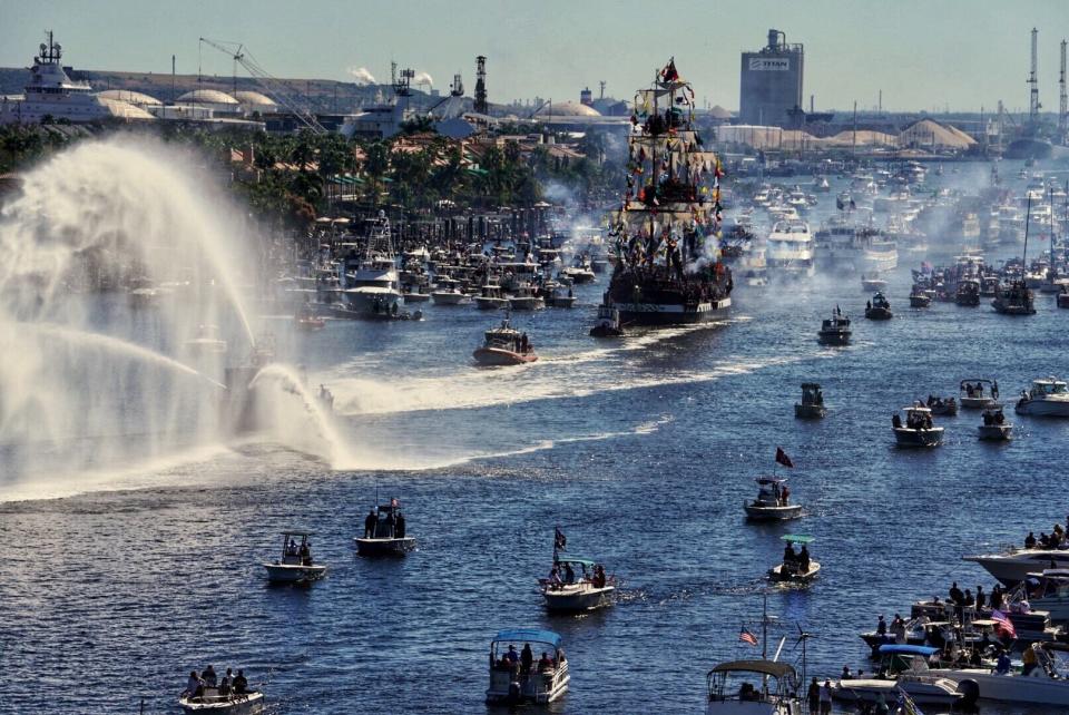 The pirate ship Jose Gasparilla bears down on Tampa, Fla., for the annual pirate celebration on Jan. 25, 2020. The event, held as a celebration of pirate lore known as Gasparilla for more than 100 years in Tampa, has been canceled this year due to the coronavirus pandemic. Ye Mystic Krewe of Gasparilla says the next one won't be held until January 2022. (Tampa Bay Times via AP)