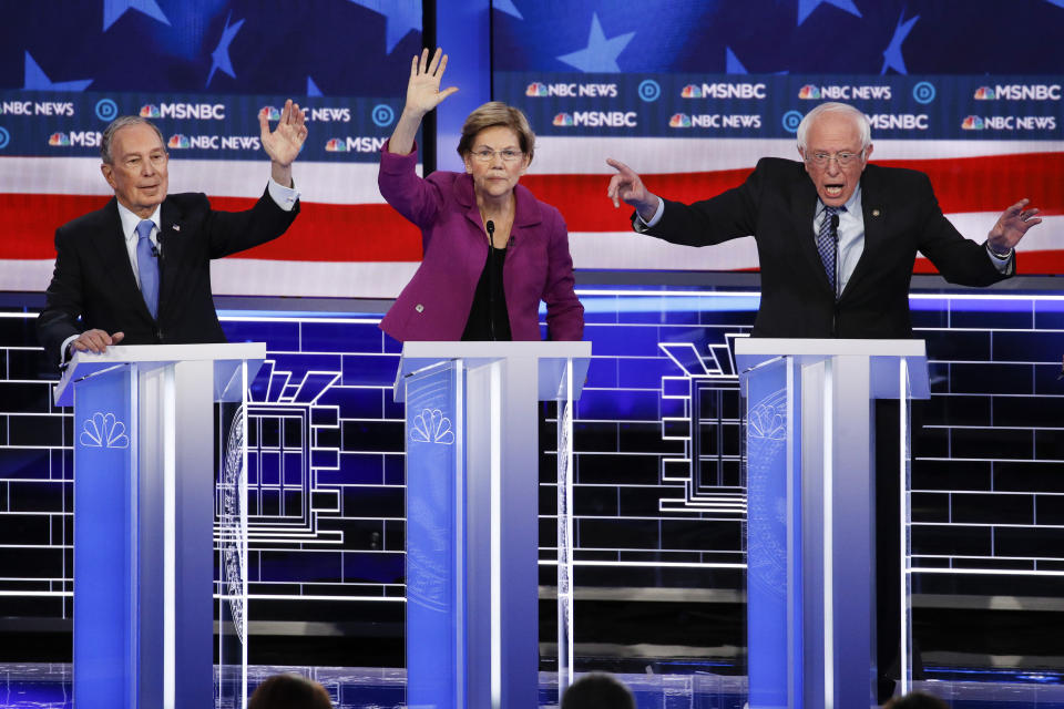 From left, Democratic presidential candidates, former New York City Mayor Mike Bloomberg, Sen. Elizabeth Warren, D-Mass., Sen. Bernie Sanders, I-Vt., participate in a Democratic presidential primary debate Wednesday, Feb. 19, 2020, in Las Vegas, hosted by NBC News and MSNBC. (AP Photo/John Locher)